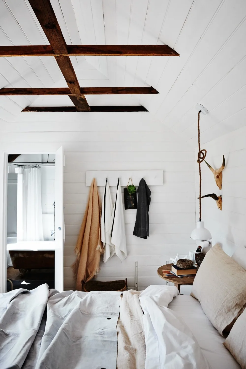 White bedroom in a home designed by Lynda Gardener