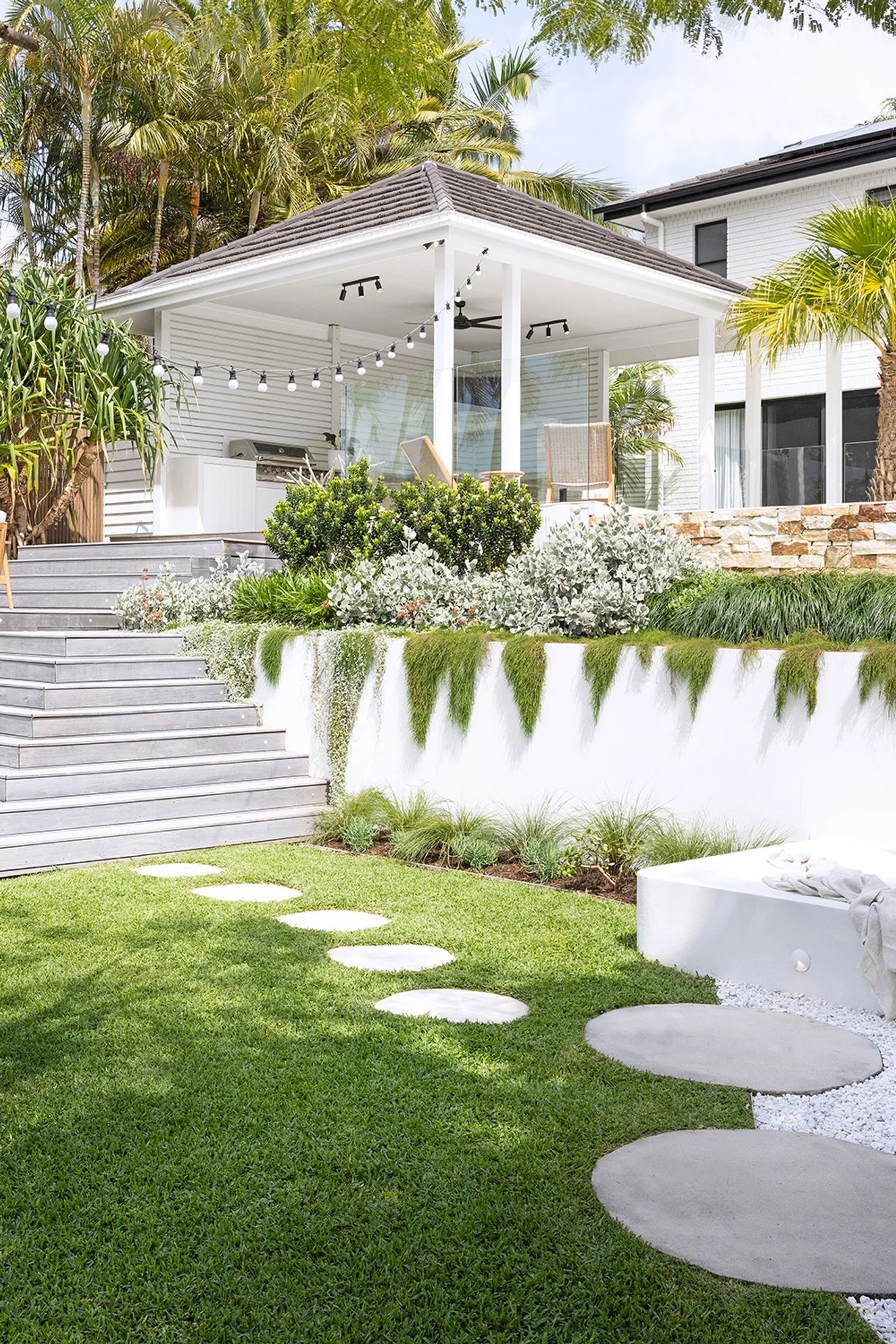 White exterior Gold Coast landscaped garden oasis