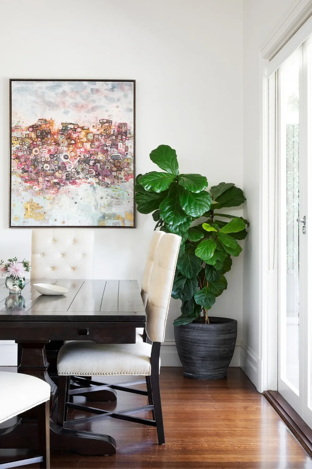Living room with large indoor planter in corner
