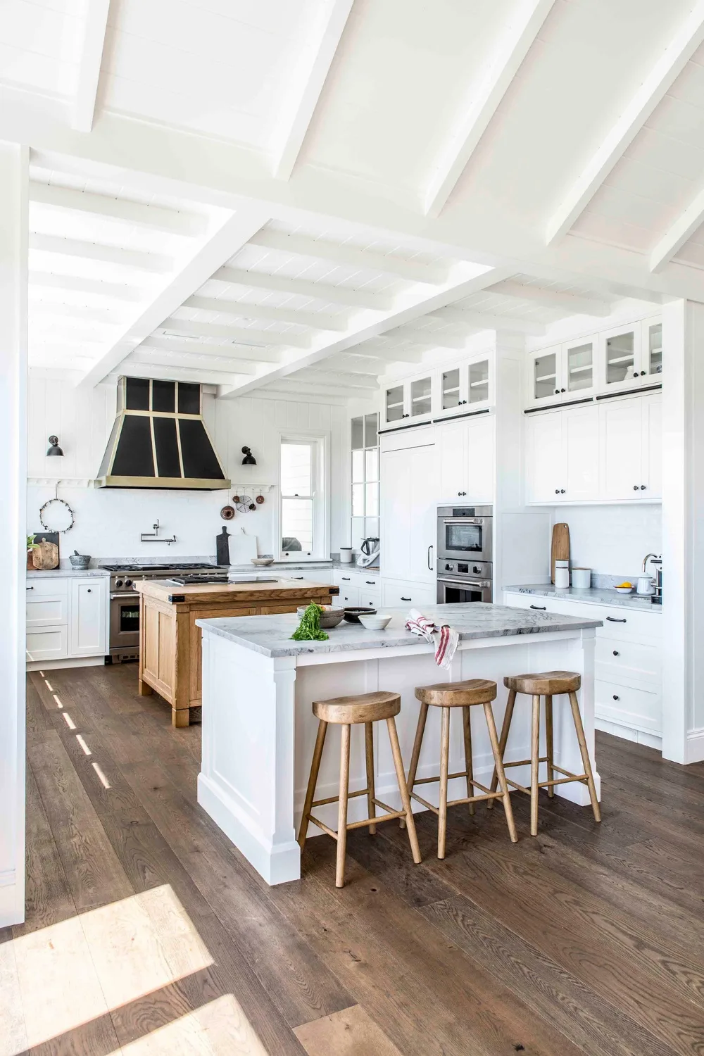 Hamptons style kitchen with two island benches