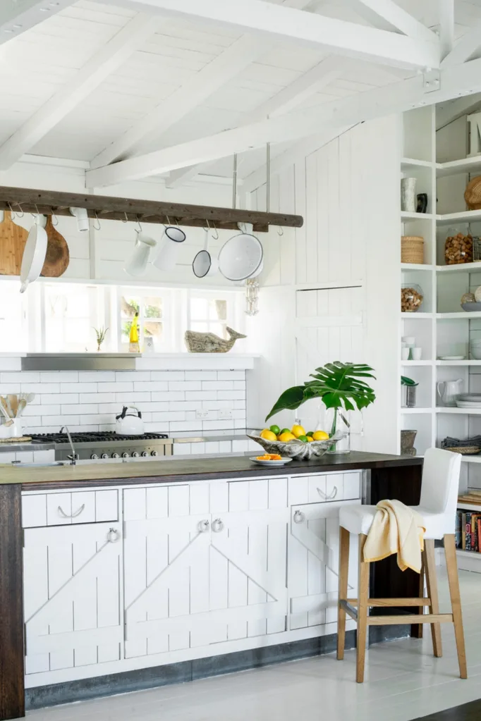 Farmhouse style kitchen with hanging pot rack