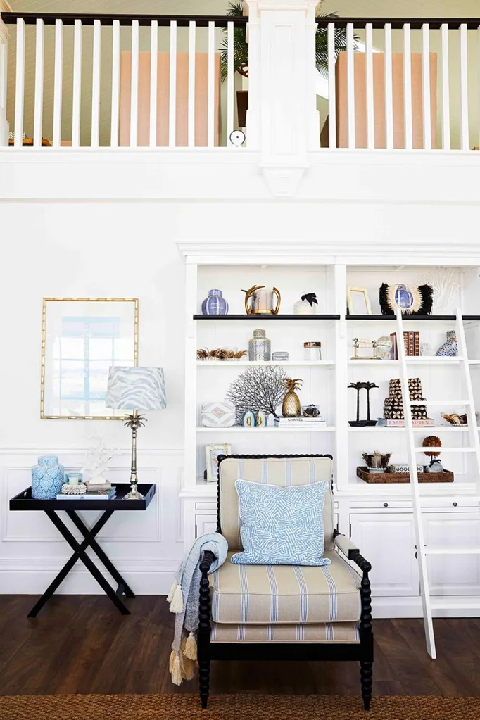 Hamptons style living room with book shelf