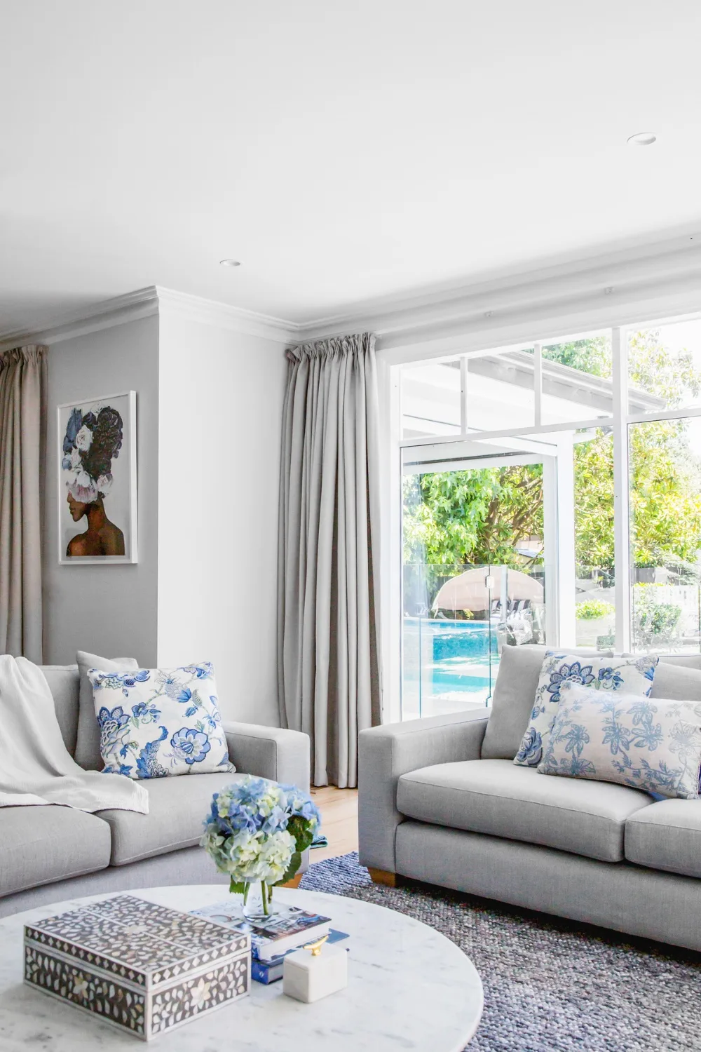 Hamptons style home with grey colour palette and grey drapes. spring home refresh.
