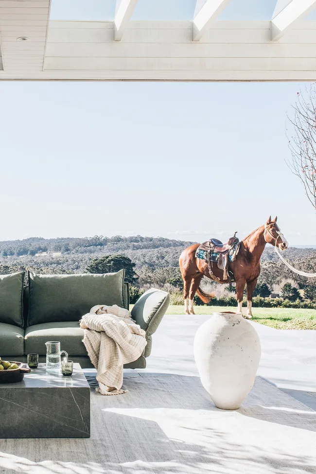 green outdoor sofa outdoor living room horse