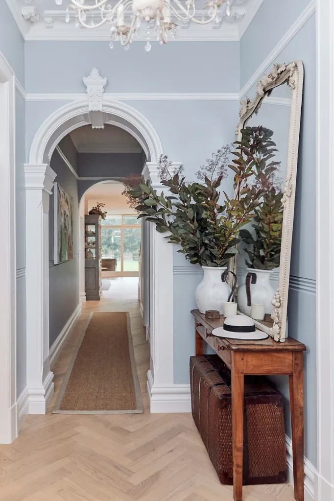 Federation style entrance hallway with blue walls