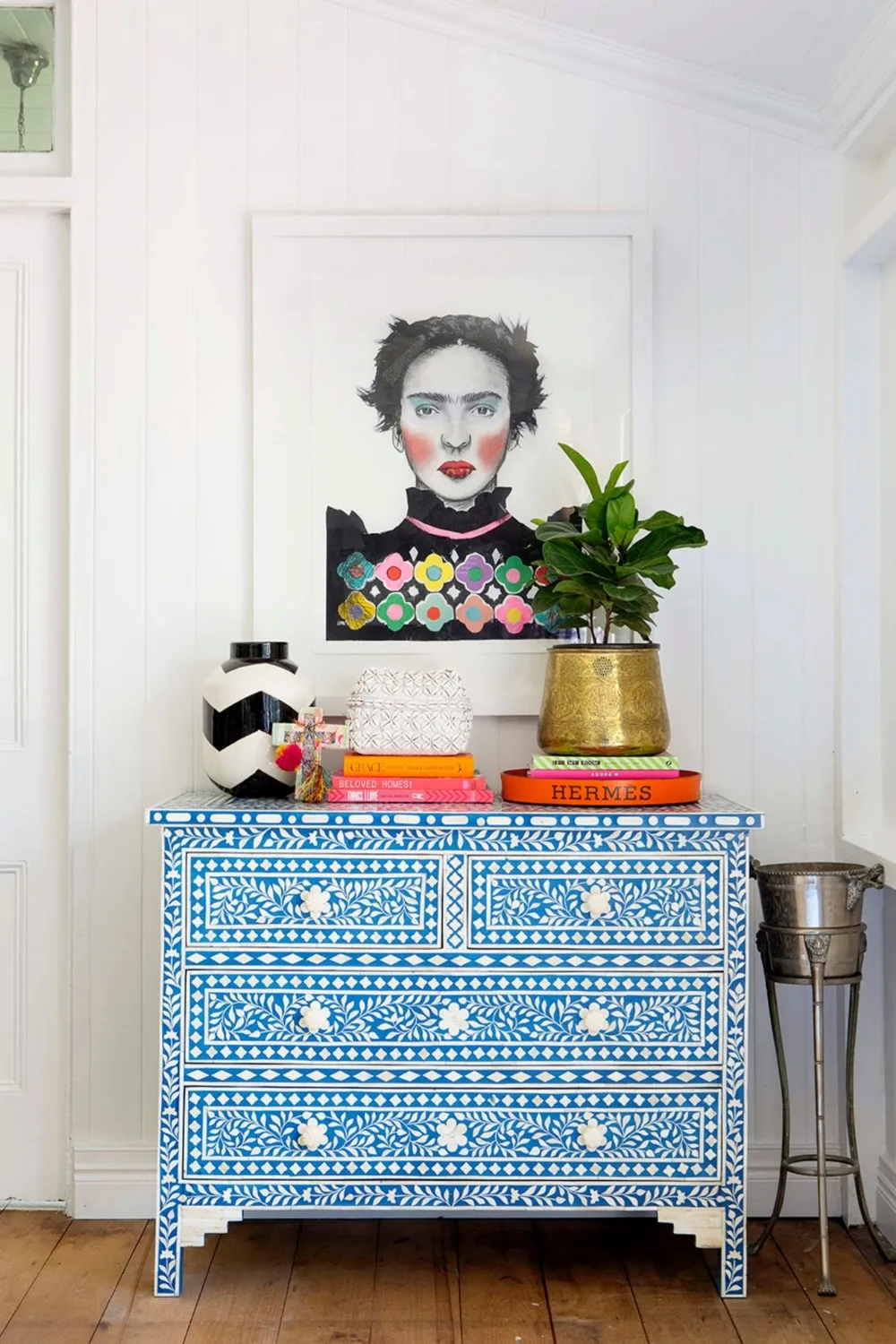 Sideboard with coffee table books on top