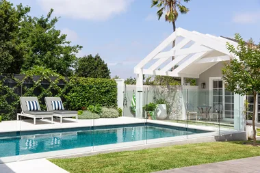 A landscaped garden is reimagined to create an elegant poolside oasis