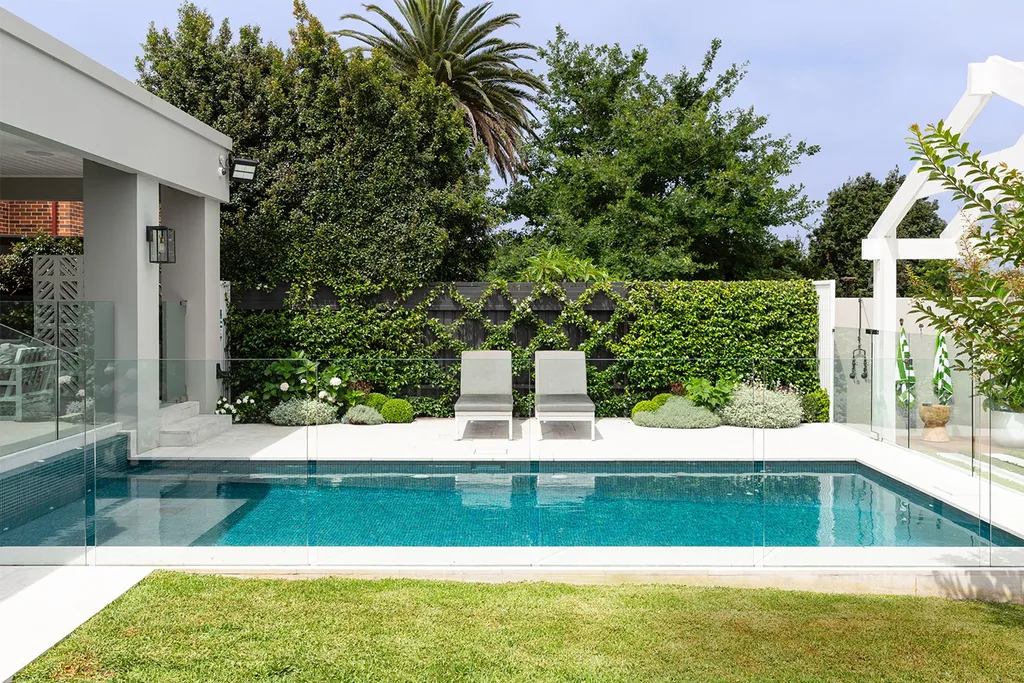 landscaped garden pool glass fence