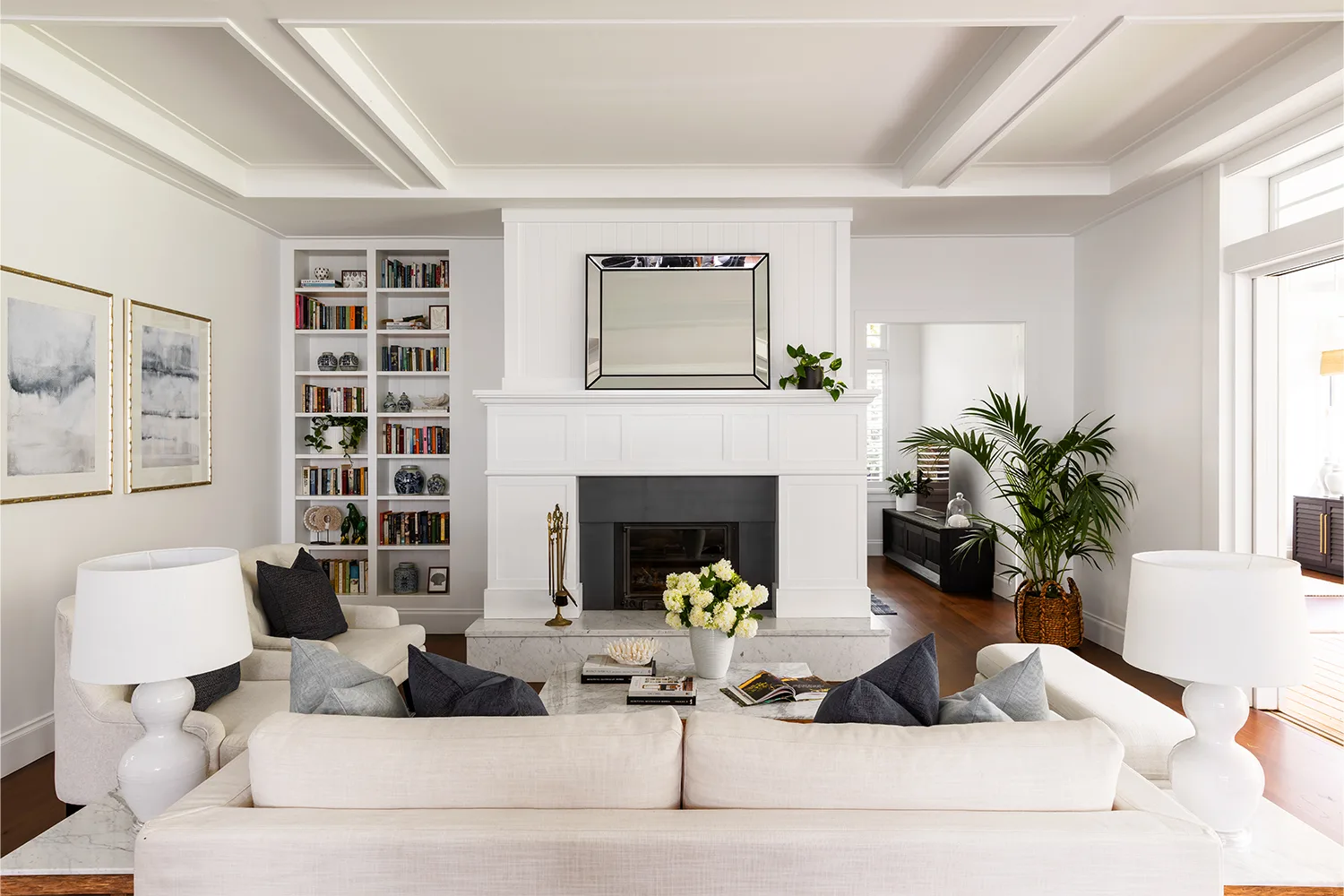 Hamptons style living room with fireplace and marble hearth