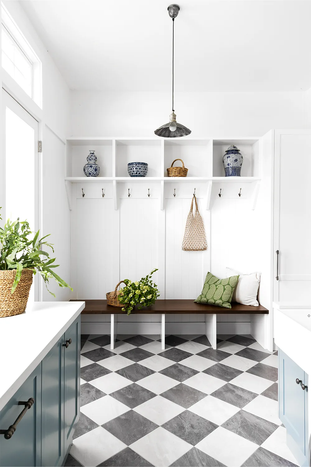 Mudroom with chequerboard tiles