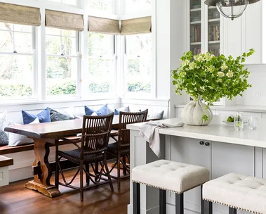 Hamptons style kitchen with breakfast nook and banquette seating