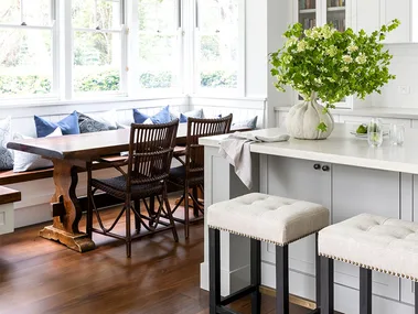 Hamptons style kitchen with breakfast nook and banquette seating