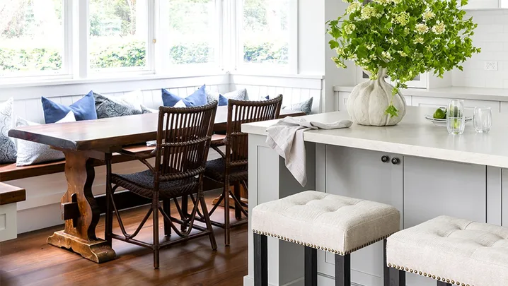 Hamptons style kitchen with breakfast nook and banquette seating