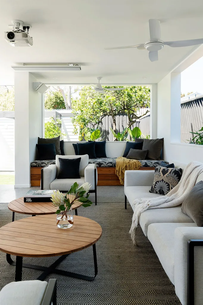 outdoor lounge area with rugs