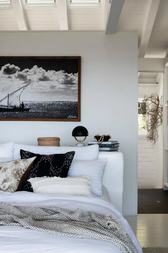 Country style bedroom with white bed linen