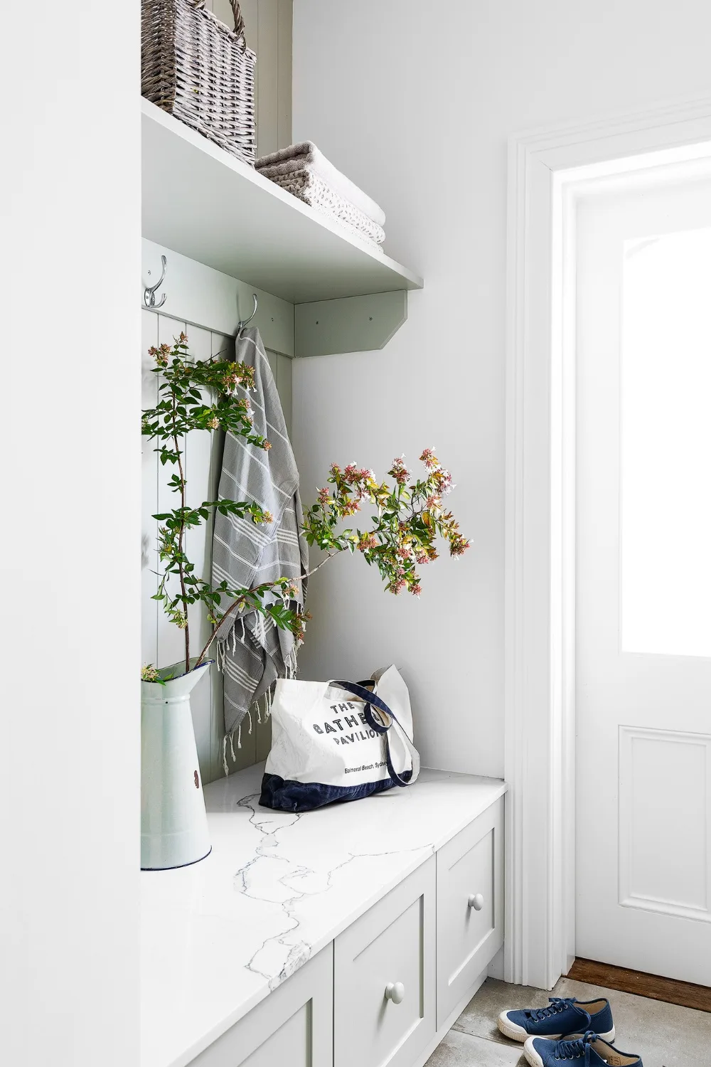 Hamptons style mud room with built in storage