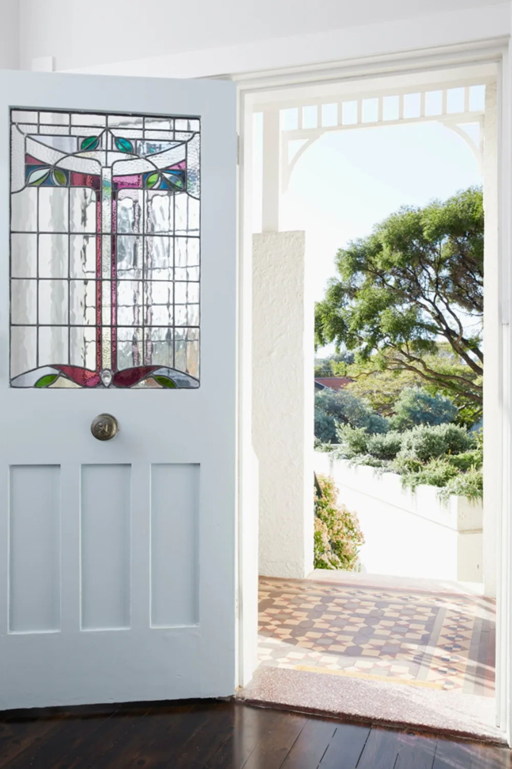 Pale blue front door of a heritage home