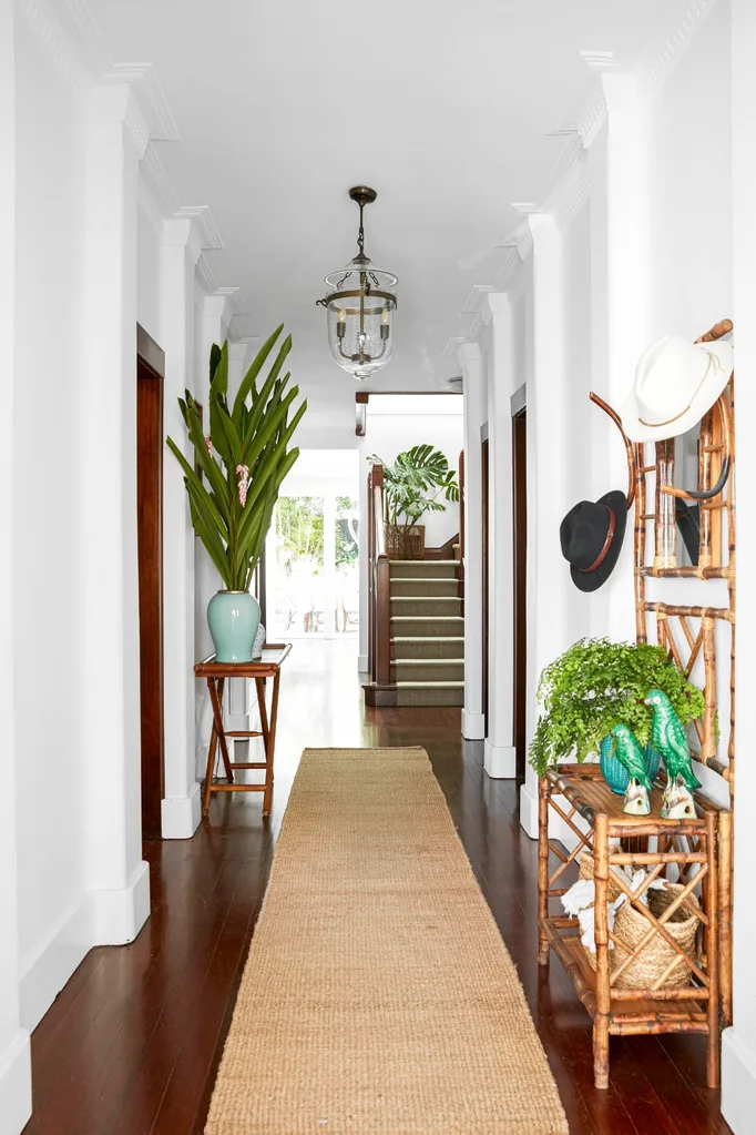 coastal bungalow hallway timber floors jute rug