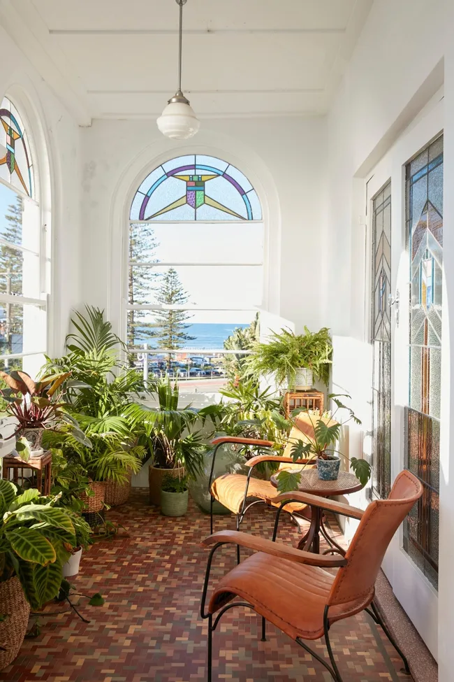 tiled sitting room with ocean views in family bungalow