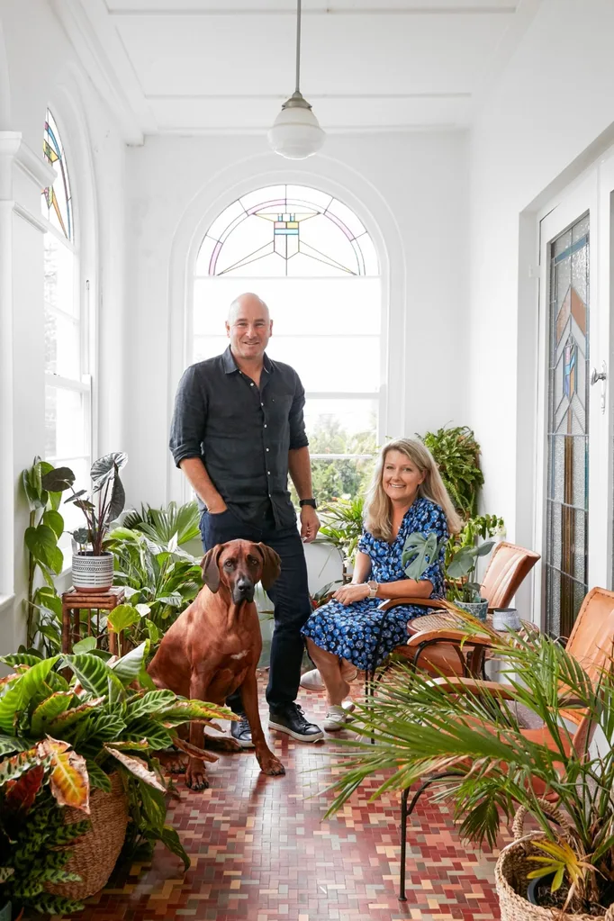 homeowners and dog in sun room