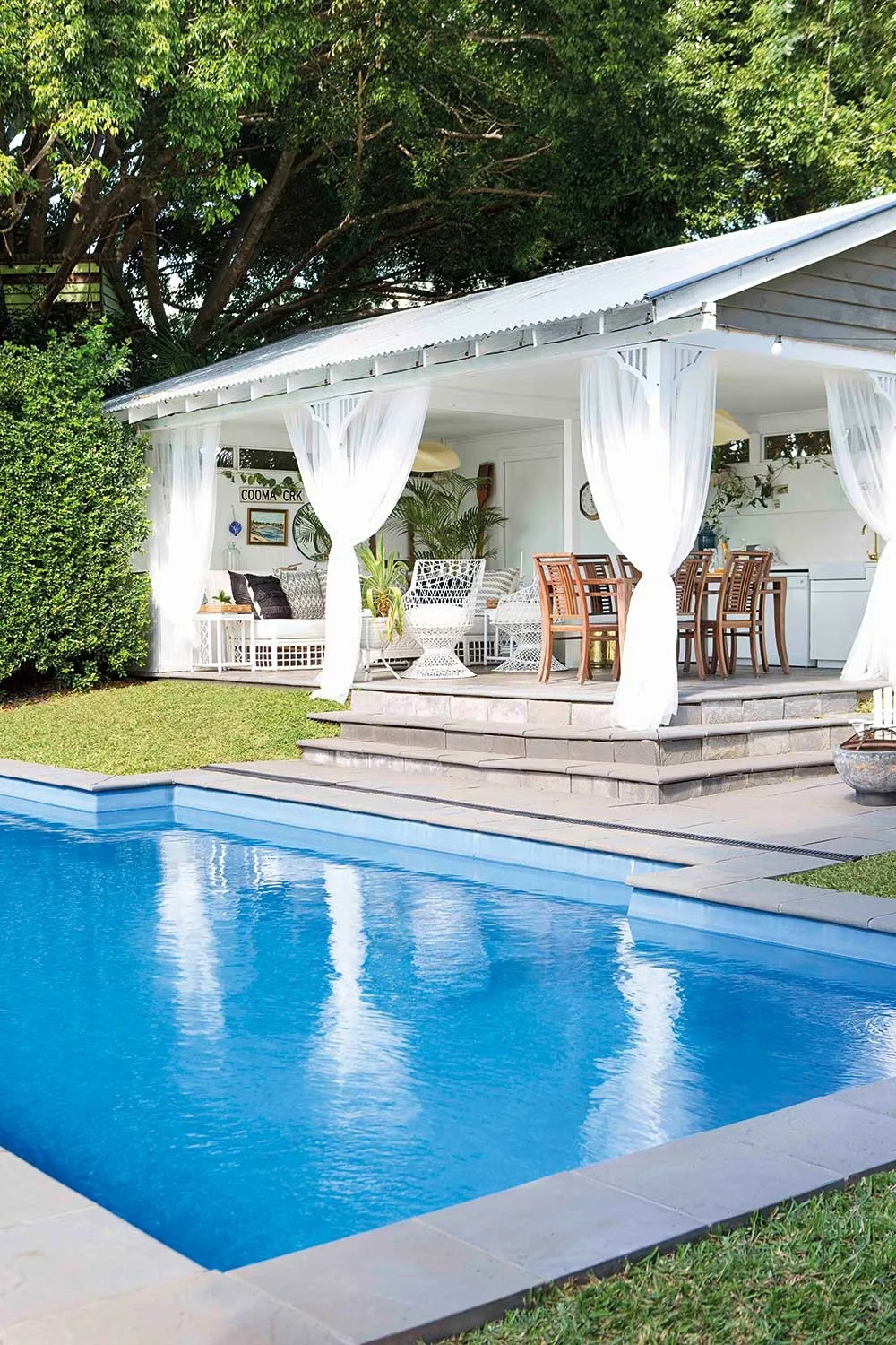 Shed converted into pool house and outdoor kitchen