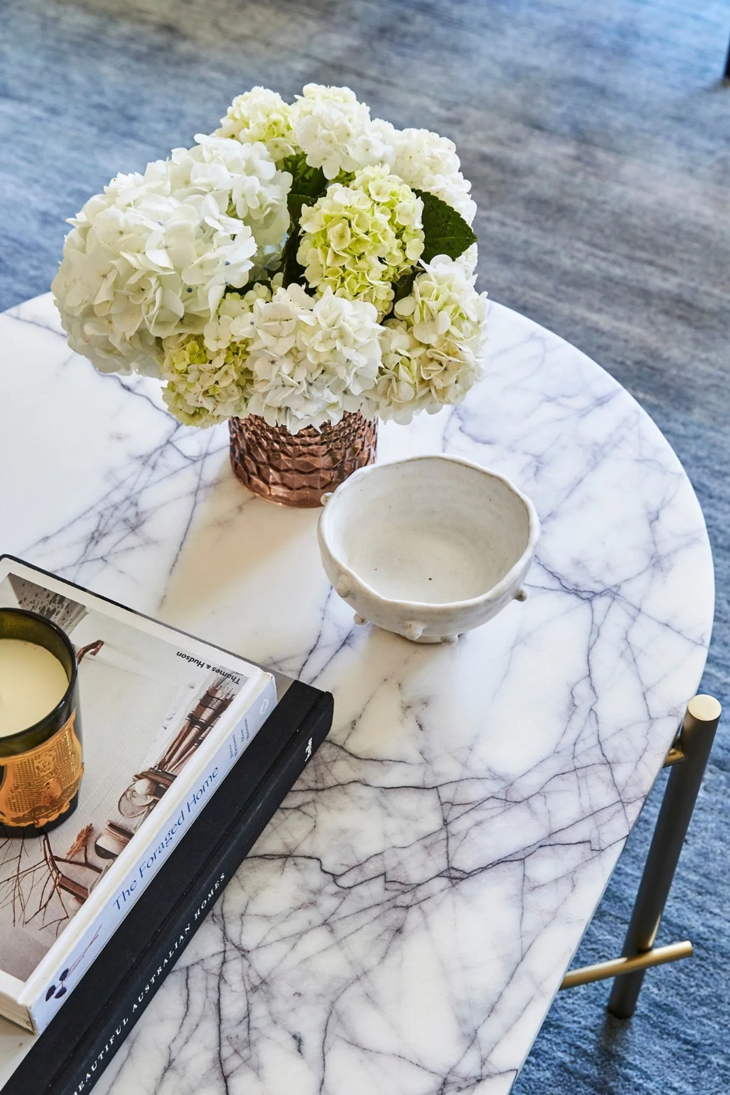 Hydrangea flower arrangement on a marble coffee table