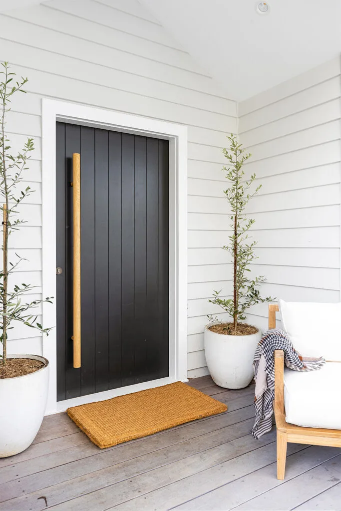 contemporary beach house black front door