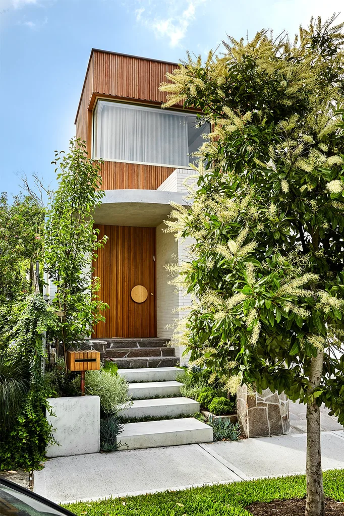 front-house-timber-door-pavers-tree