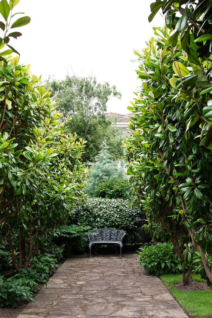 hobart-century-old-home-garden-love-seat-magnolias