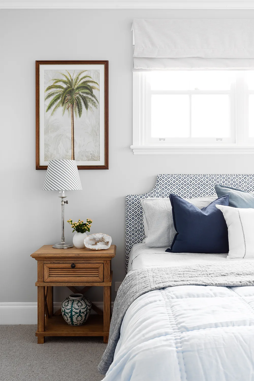 Classic coastal bedroom with botanicla art print