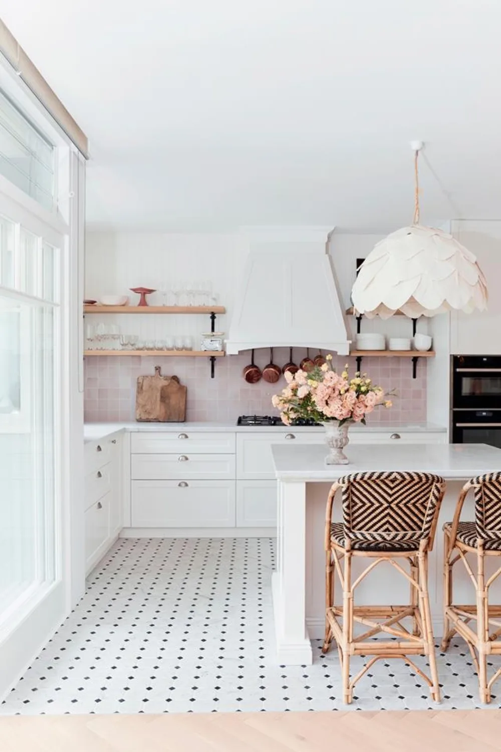 Pink Hamptons kitchen with mosaic tiled floor