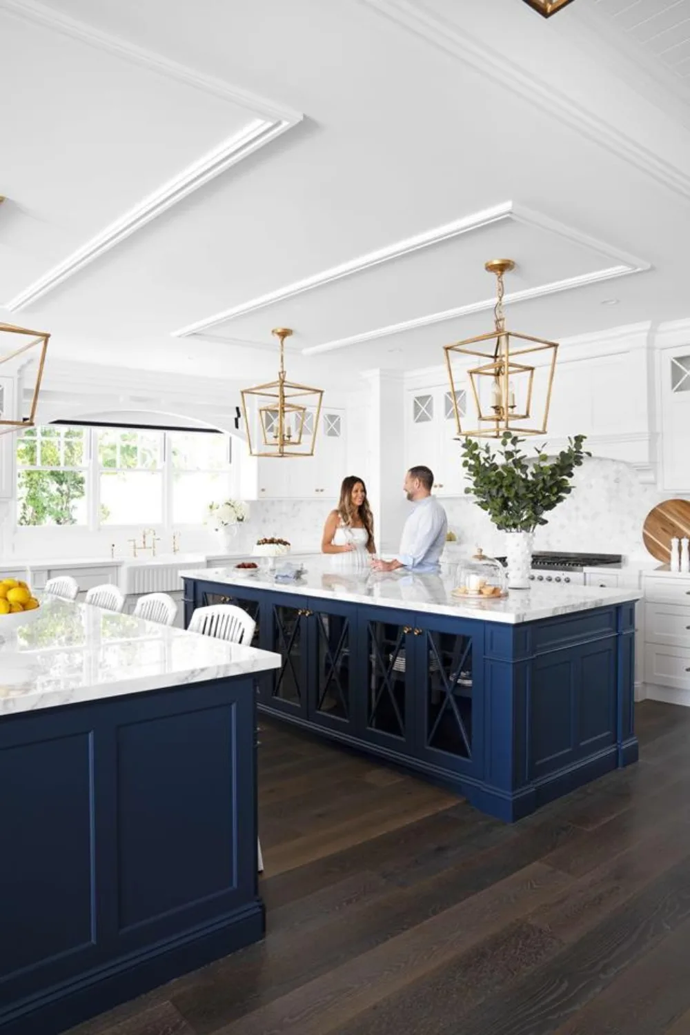 Hamptons kitchen with double navy island benches