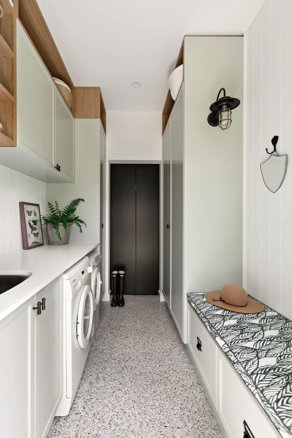 Modern farmhouse laundry with terrazzo flooring