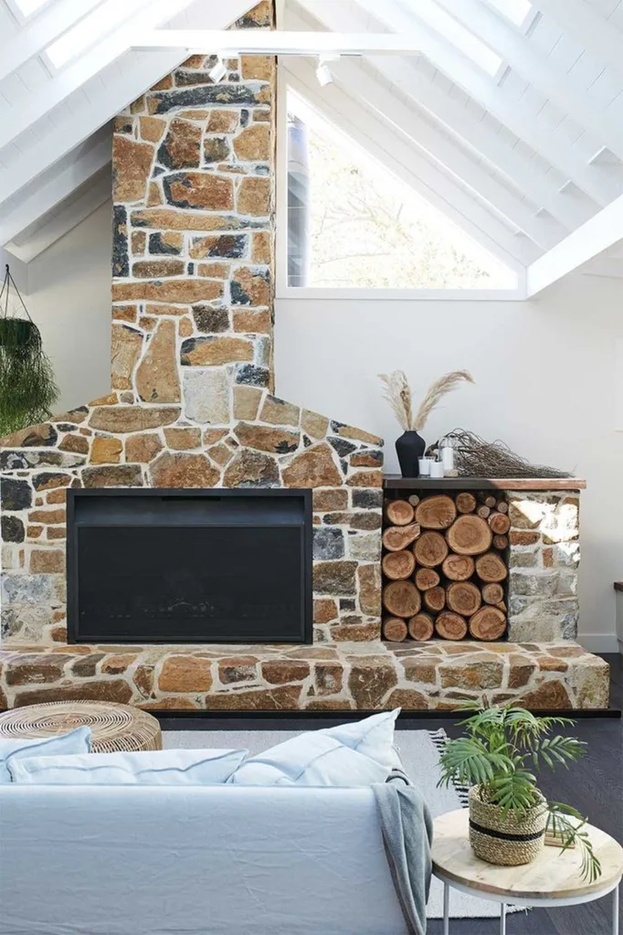 Stone fireplace in the living room of SOUL of Gerringong