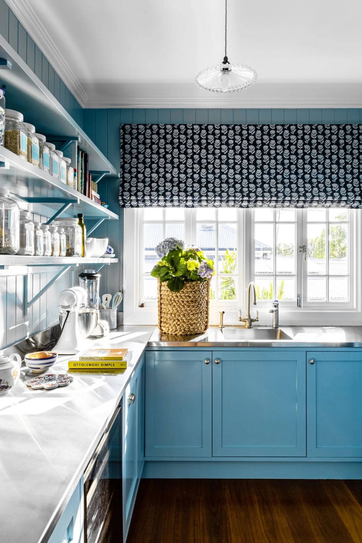 This stainless steel benchtop in a butler's pantry is an alternative to engineered stone.