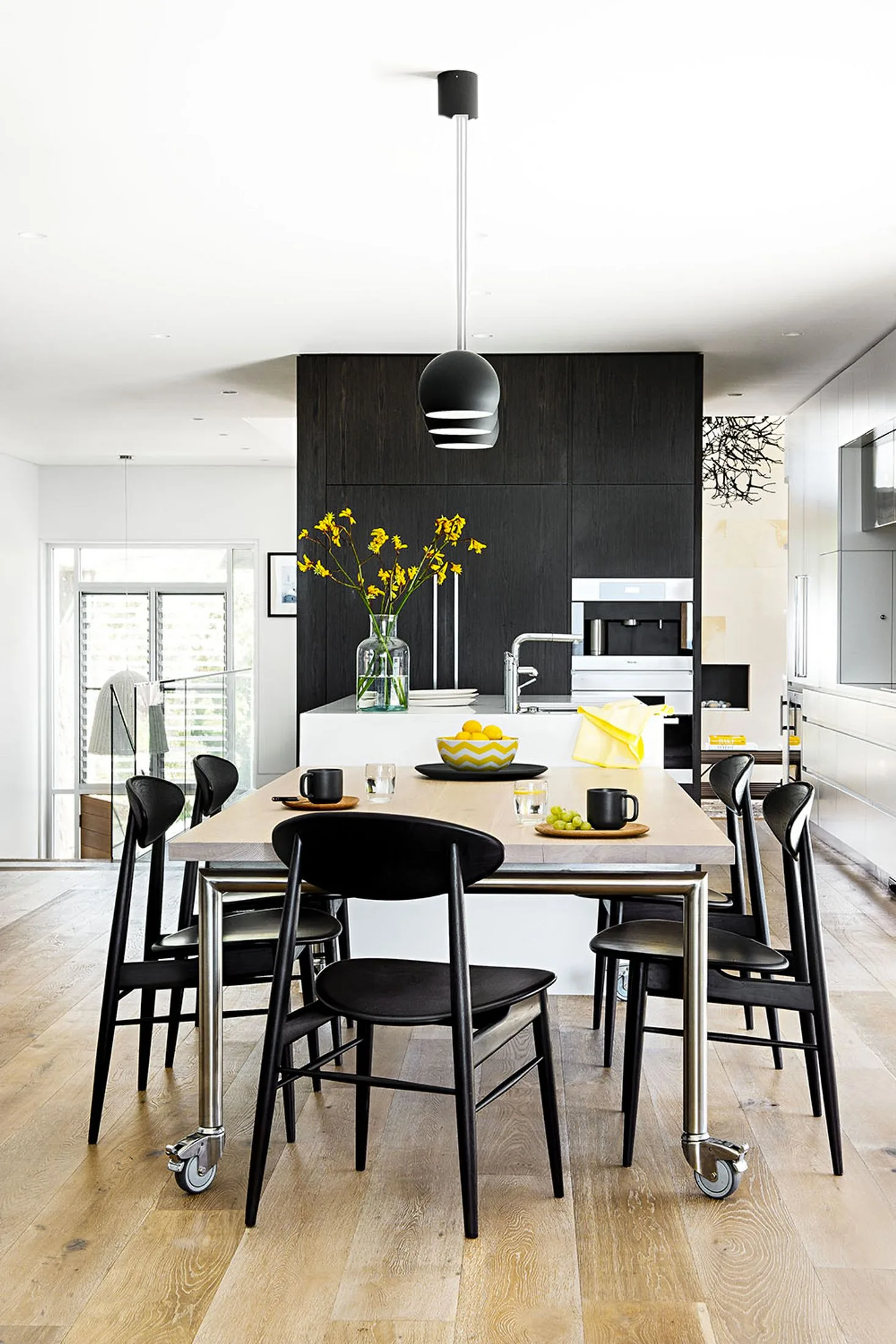 Black and white kitchen with Mark Tuckey table