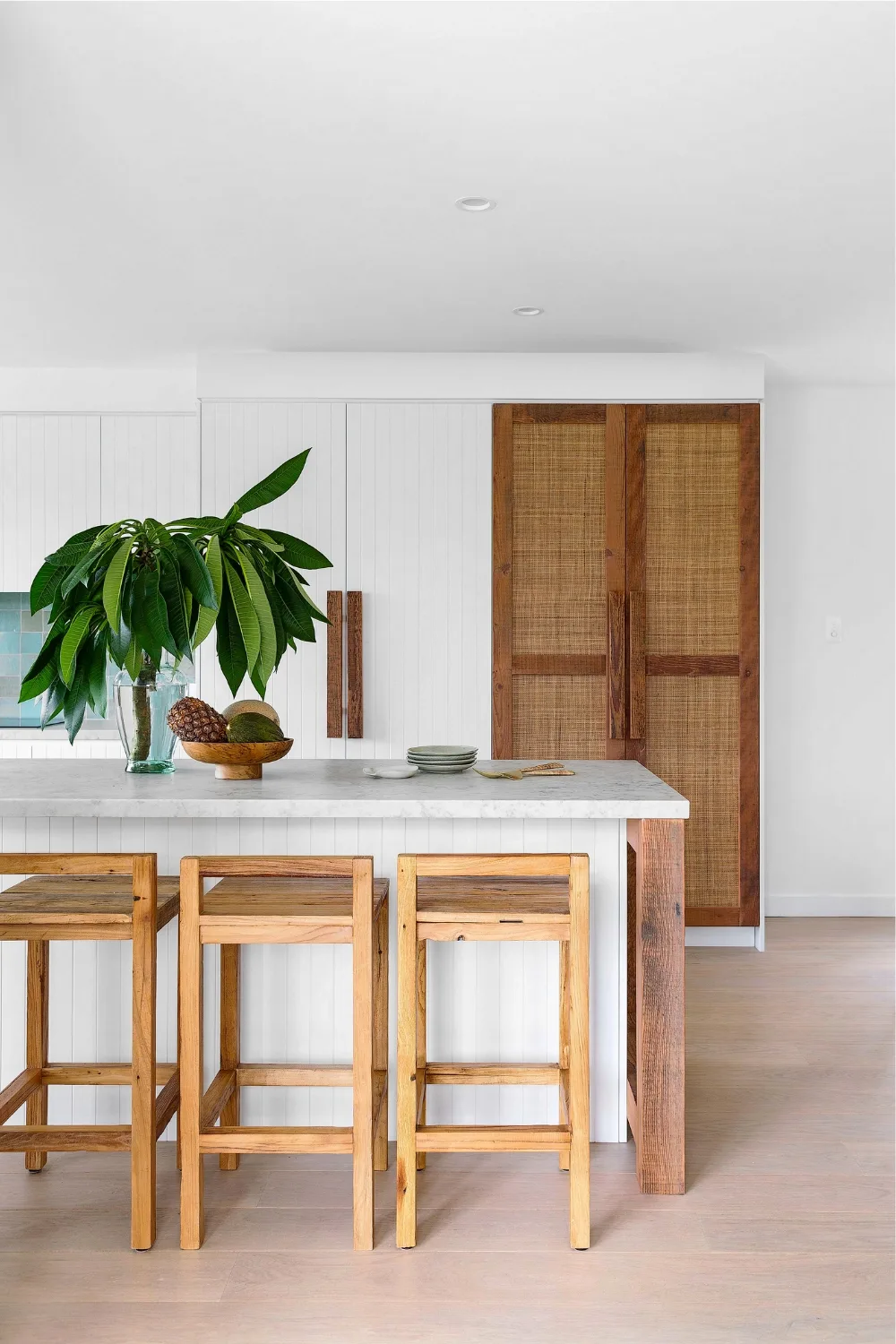 Kitchen with rattan cupboard doors