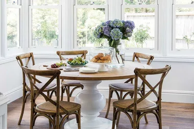 Take a seat at one of these gorgeous Hamptons-style dining tables