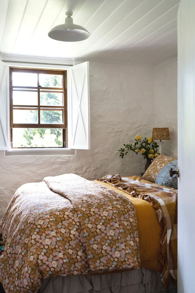 small bedroom in heritage cottage