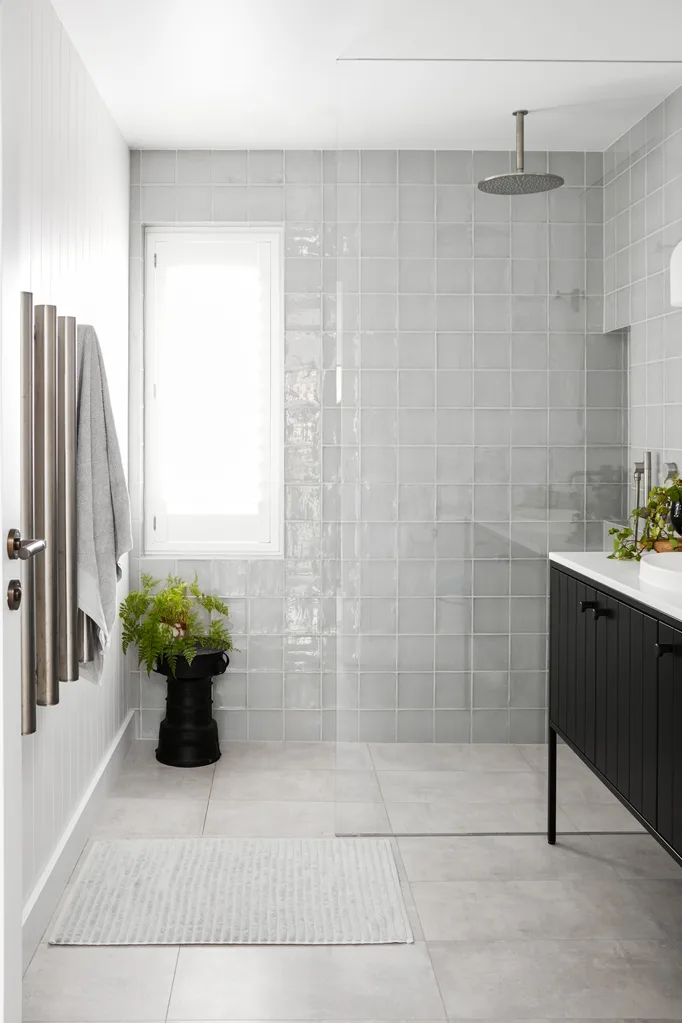 contemporary coastal bathroom shower with grey tiles