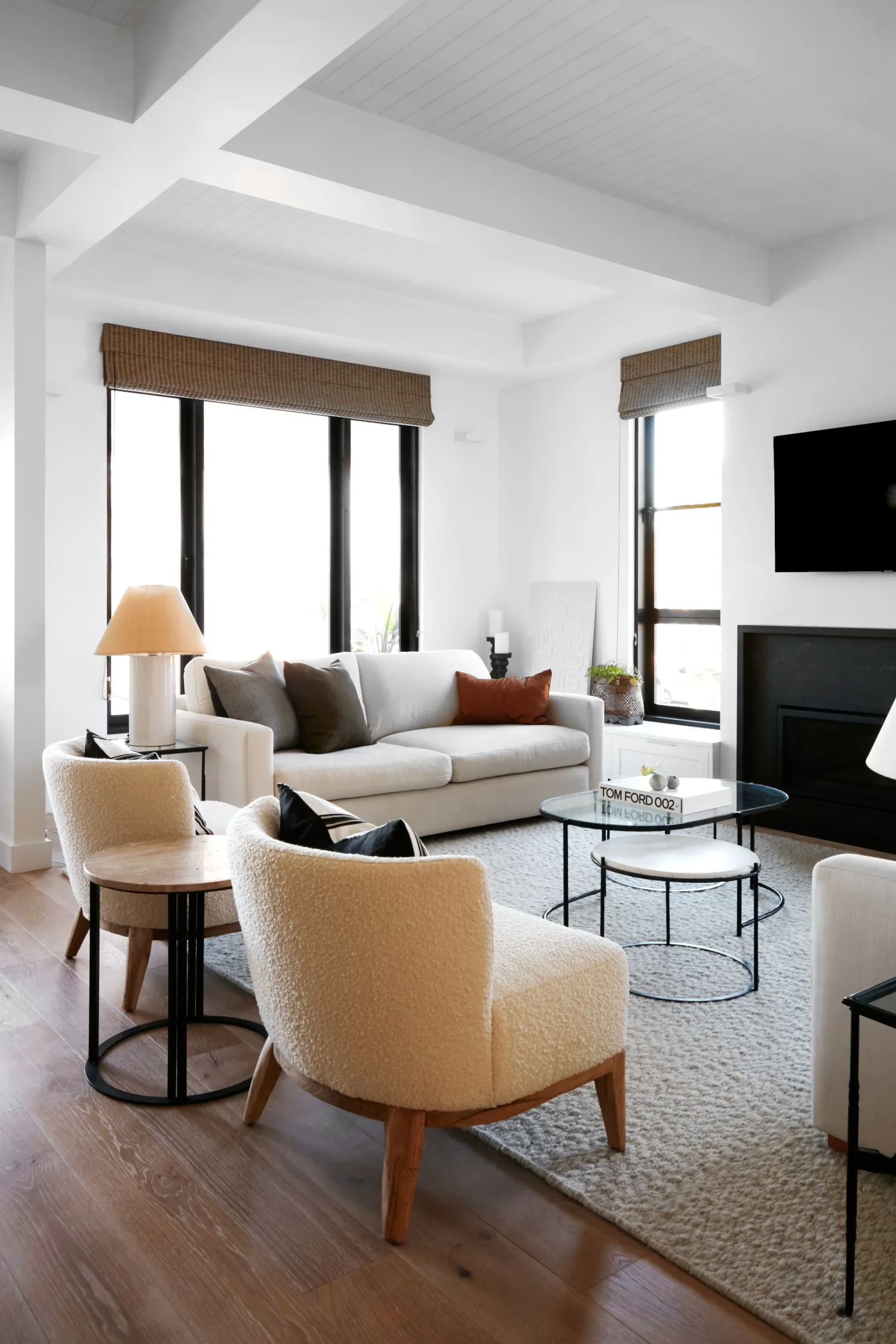 neutral living room with boucle chairs