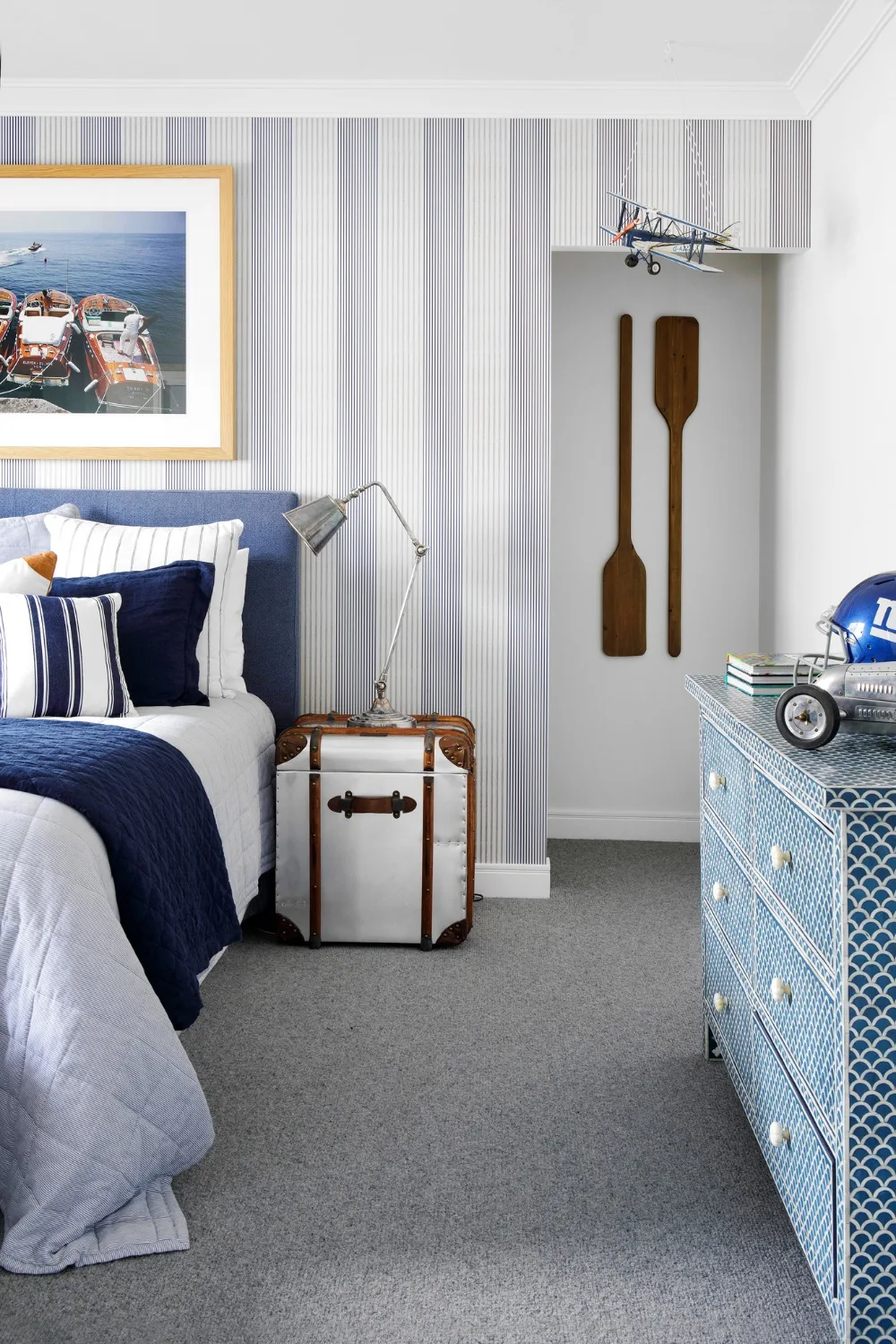 blue and white kids room with striped wallpaper