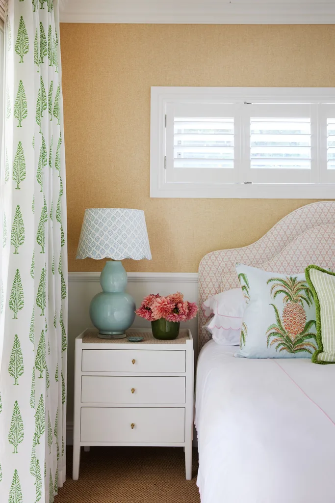 classic coastal bedroom with palm tree details