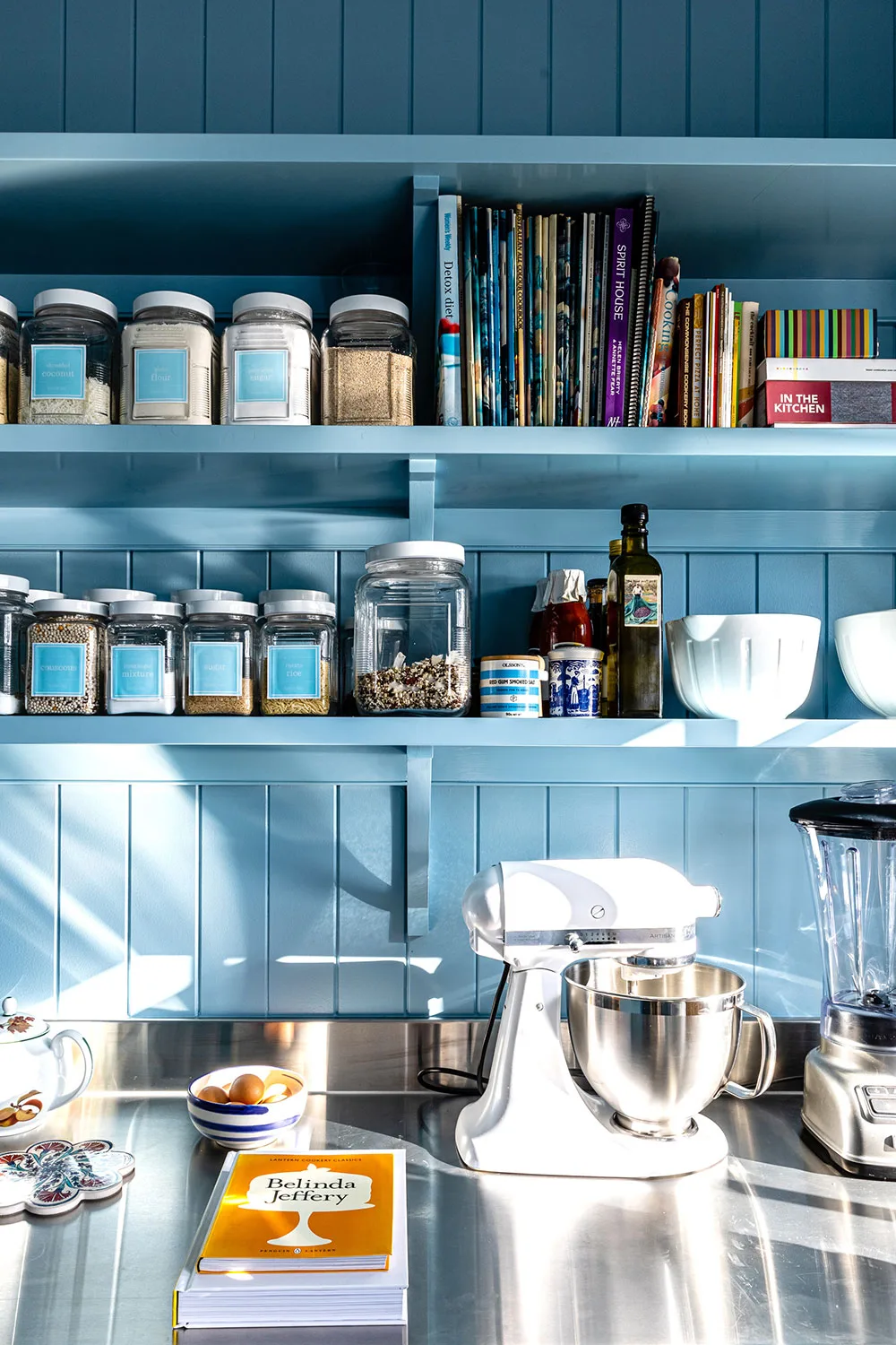 Kitchen with stainless steel benchtop materials, a surface that is becoming more popular