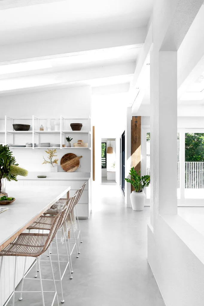 White coastal style kitchen with open shelving