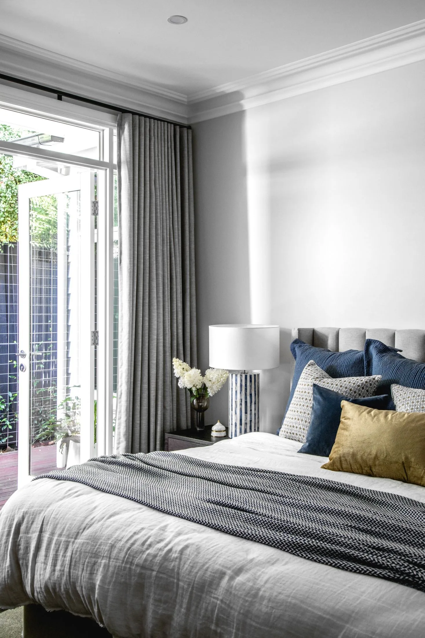 hamptons bedroom with grey and blue bedding
