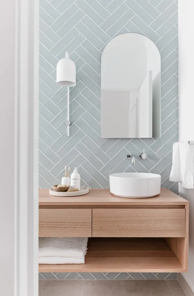 Coastal style bathroom with floating timber vanity