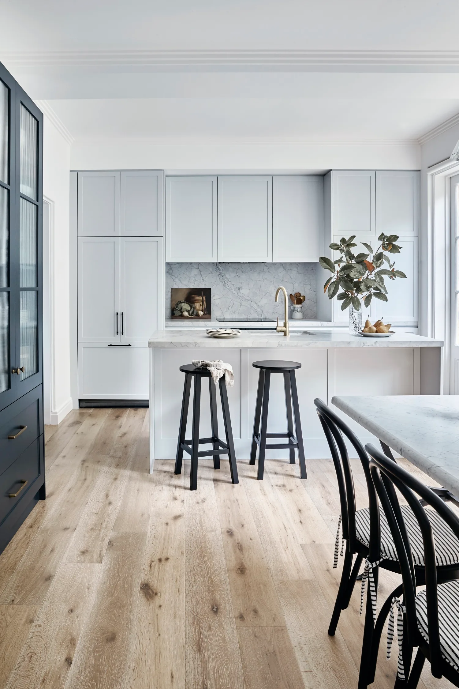 light grey kitchen with shaker cabinetry