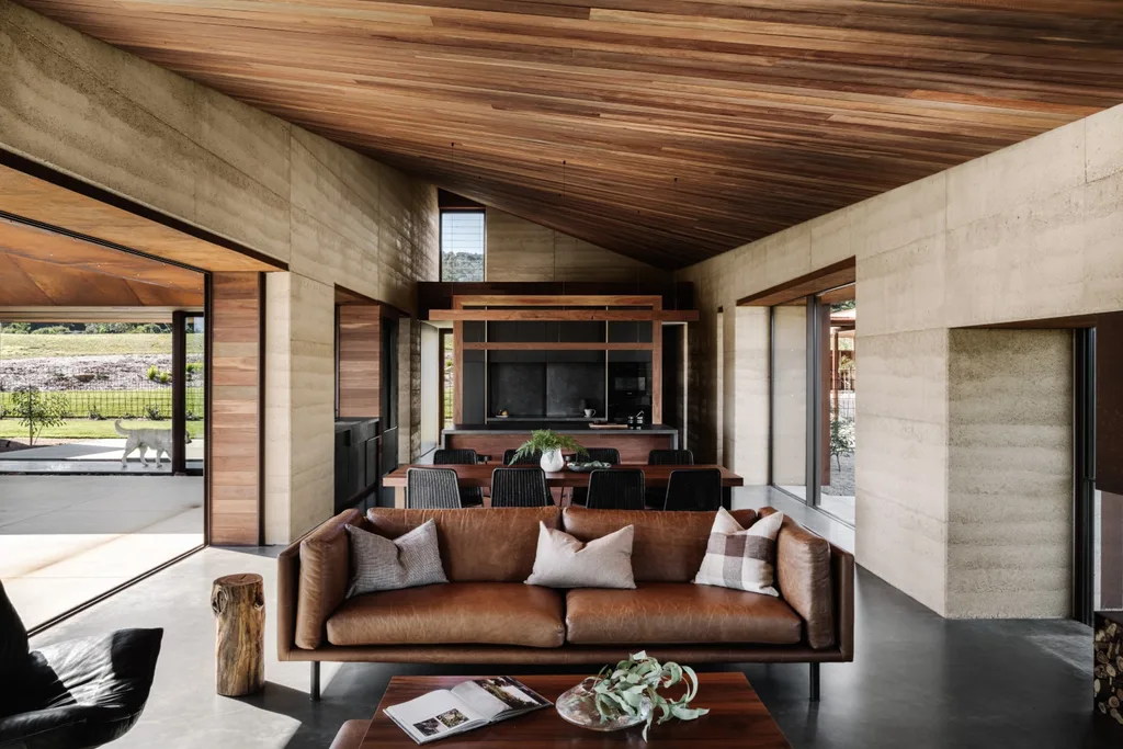 living area with polished concrete floors and timber ceiling