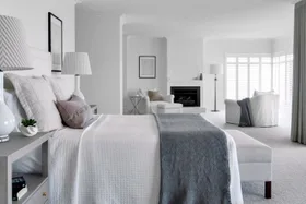 white bedroom with black accents